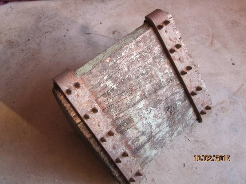 lot 37 image: Old wood wheel chock with metal spi...