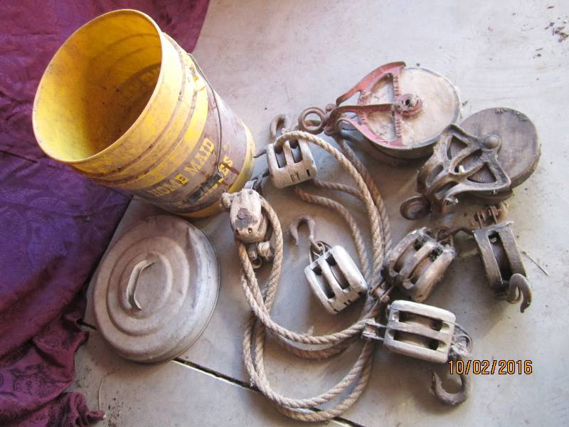 lot 53 image: Antique wood pulleys...