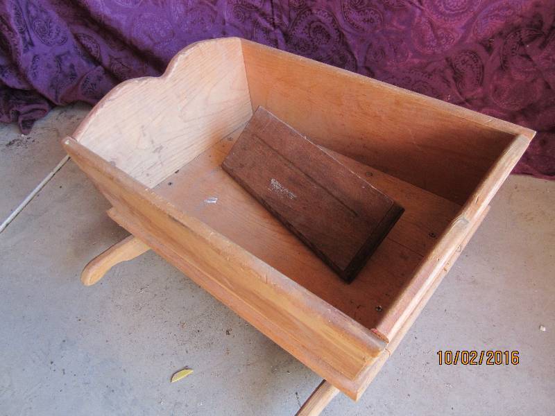 lot 56 image: Wood doll rocking cradle and plate ...