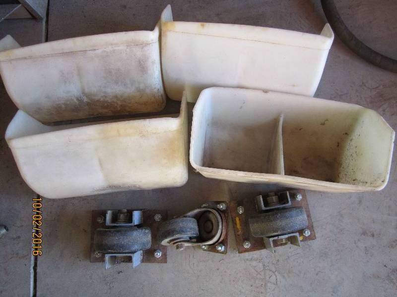 lot 86 image: 4 wheels and 4 wall caddys...
