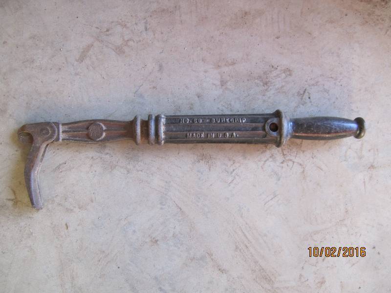 lot 89 image: Antique metal tool...