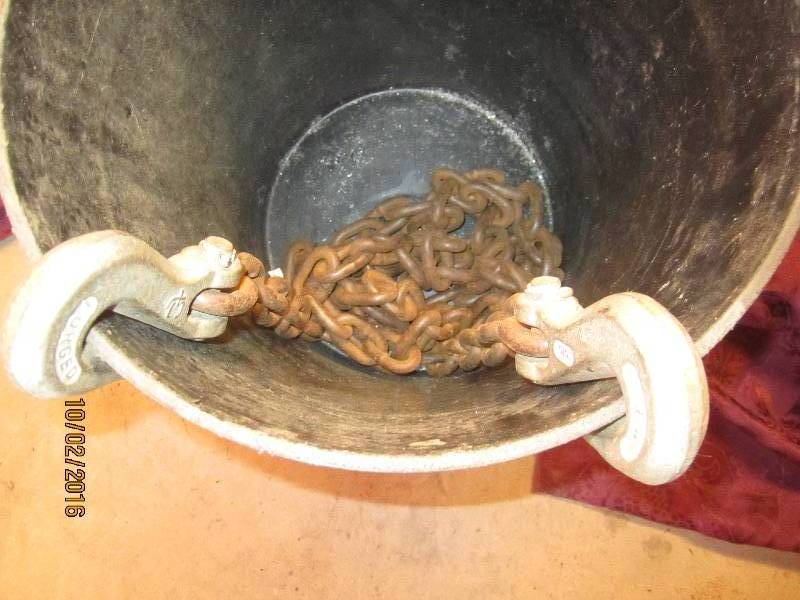 lot 94 image: Bucket of chain with hook ends...