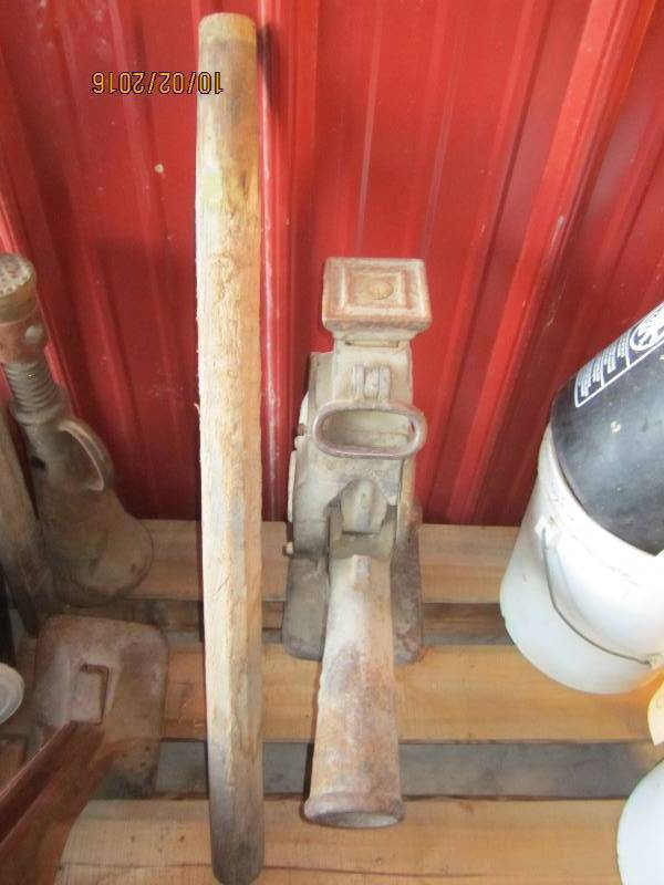 lot 101 image: Antique tractor jack with wood hand...