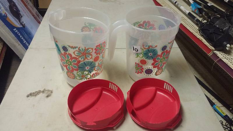 2 plastic pitchers