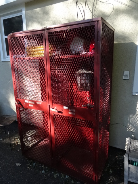 Metal cage lock up unit