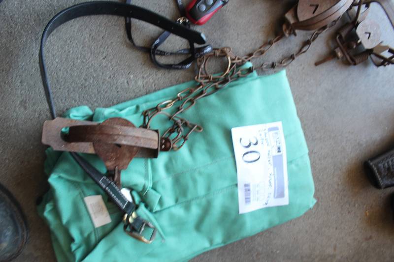 lot 30 image: Lot of Hunting Equipment Including Shock Collar, Animal Traps, Shirts, Collar