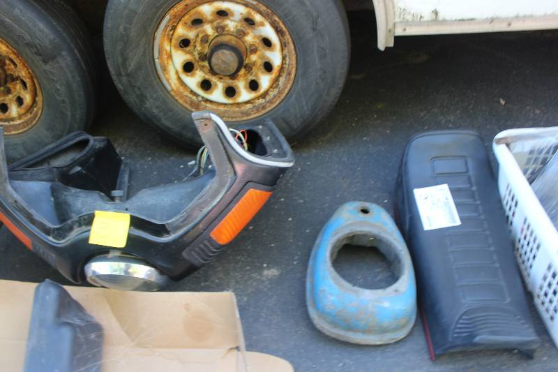 lot 57 image: Lot of (3) Motorcycle Parts Including Gas Tank(from an old outboard motor), Front Fender, Seat