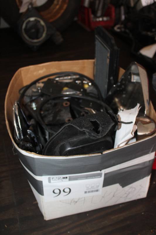 lot 99 image: Lot of Misc Motorcycle Parts Including Honda Valkyrie Plate, Saddle Bags, And More