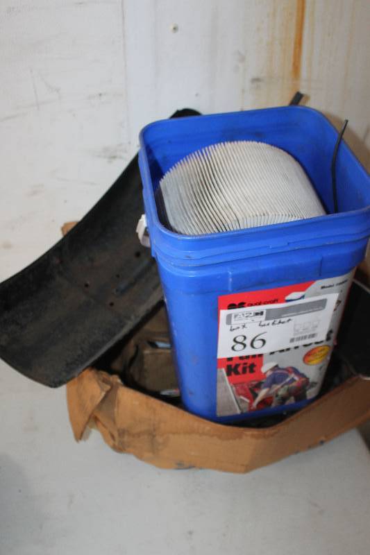 lot 86 image: Box & Bucket Lot of Motorcycle Parts Including Transmission, Wheel Covers, And More