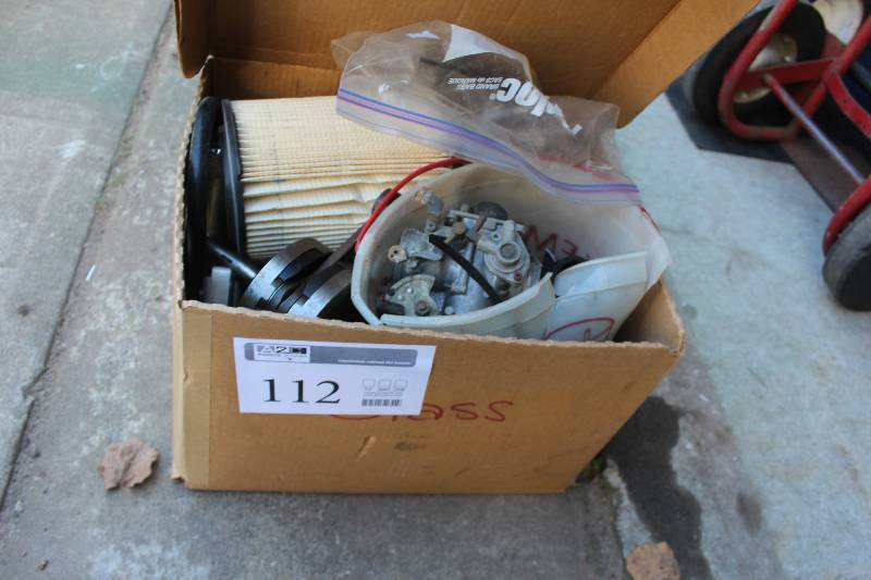 lot 112 image: Lot of Motorcycle Parts Including Carburetor, Filters, And More