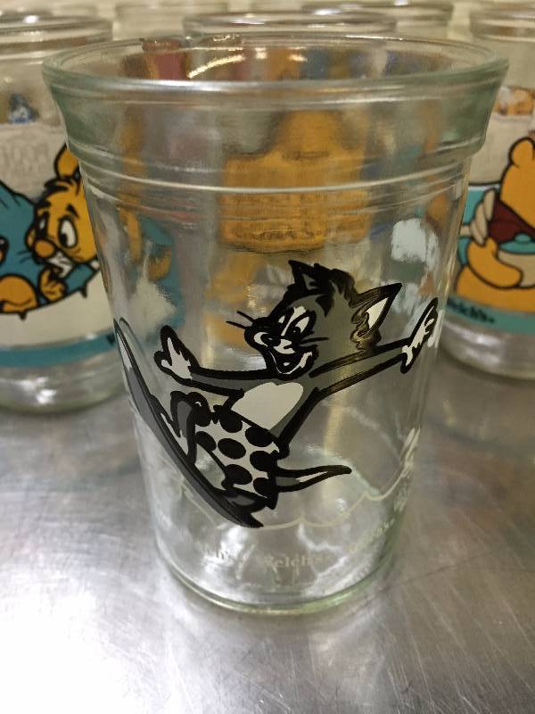 lot 16 image: WELCH GLASSES POOH, LION KING, TOM AND JERRY