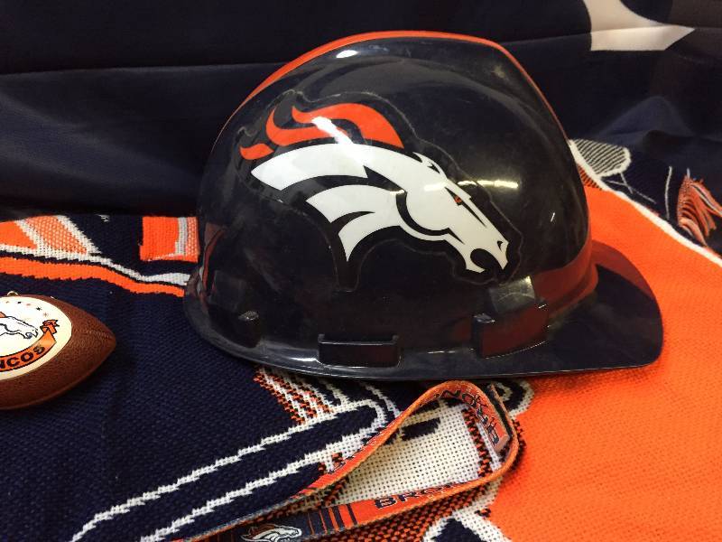 lot 27 image: DENVER BRONCOS ITEMS, COAT, HATS, FLAG, HARD HAT, SHOT GLASS, FOOTBALL AND MORE