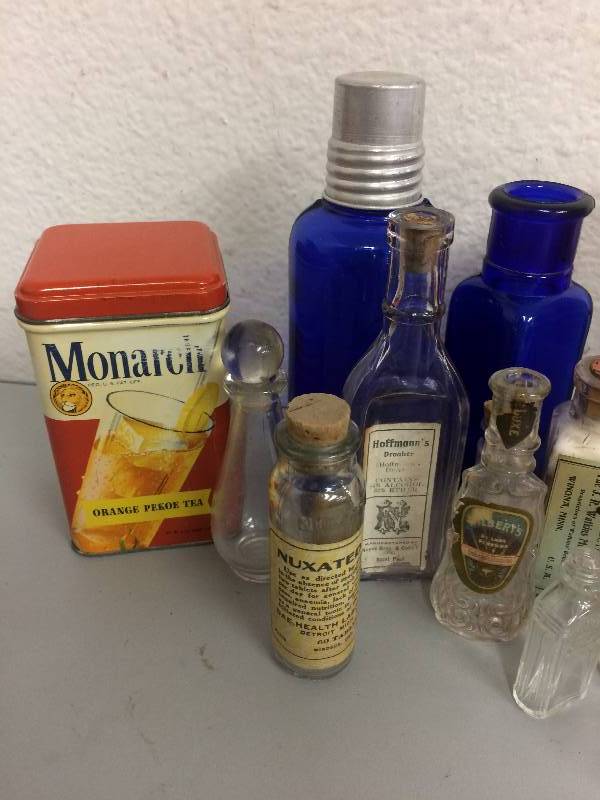lot 84 image: Assorted Tins and Bottles