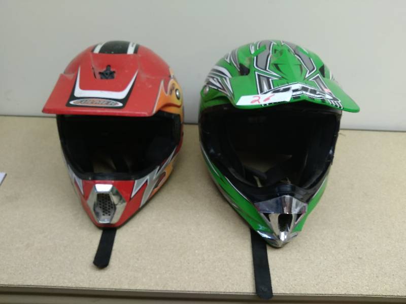 lot 26 image: Two Helmets