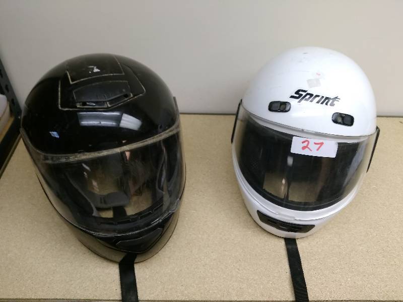 lot 27 image: Two Helmets