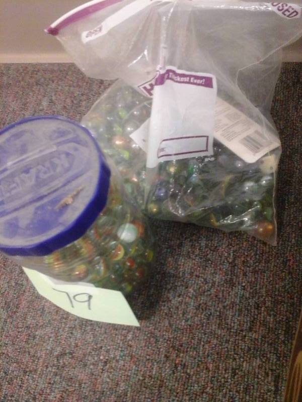 lot 79 image: Bag and Jar of Marbles
