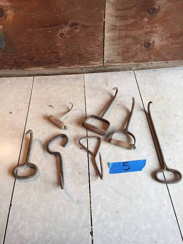 LOT OF OLD HAY HOOKS