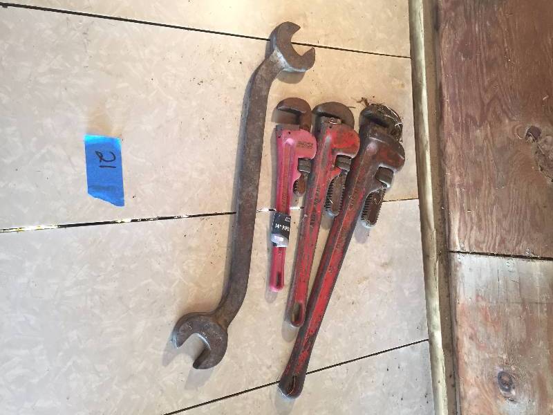OLD WRENCH AND THREE PIPE WRENCHES