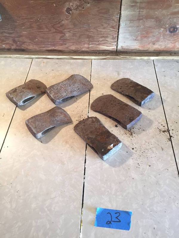 SIX OLD AXE HEADS