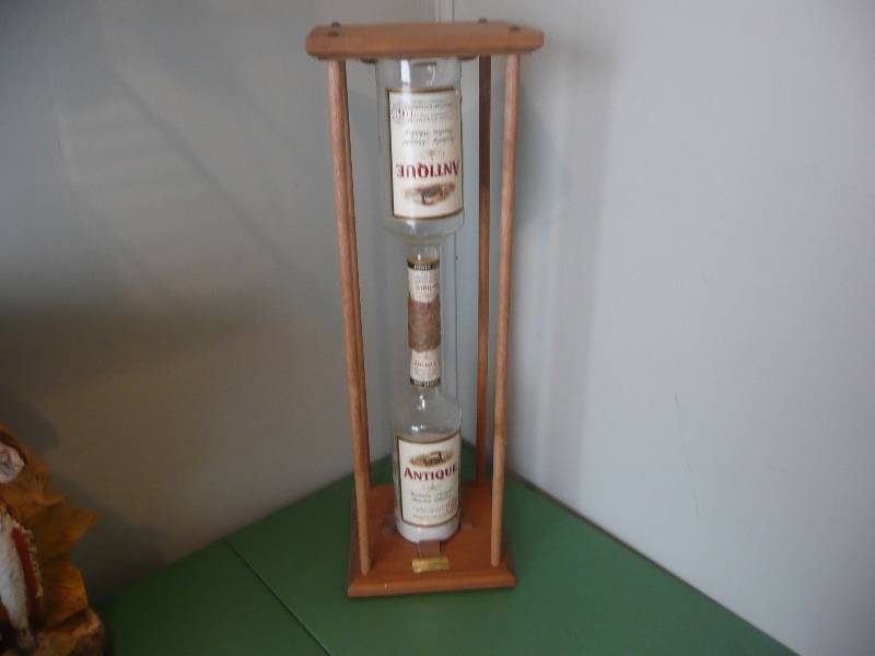 lot 19 image: VINTAGE FOLK ART WHISKEY BOTTLE HOUR GLASS - ONE OF A KIND - APPROX 2FT HIGH