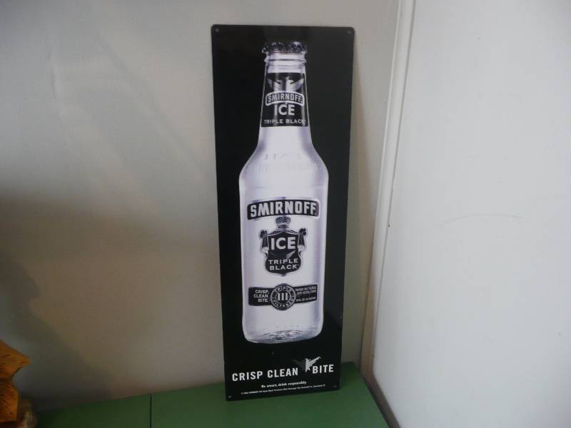 lot 30 image: SMIRNOFF TIN