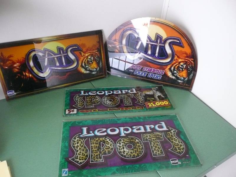 lot 41 image: 2 SETS OF SLOT MACHINE BACK GLASS - COULD EASILY BE MADE INTO A LIGHT