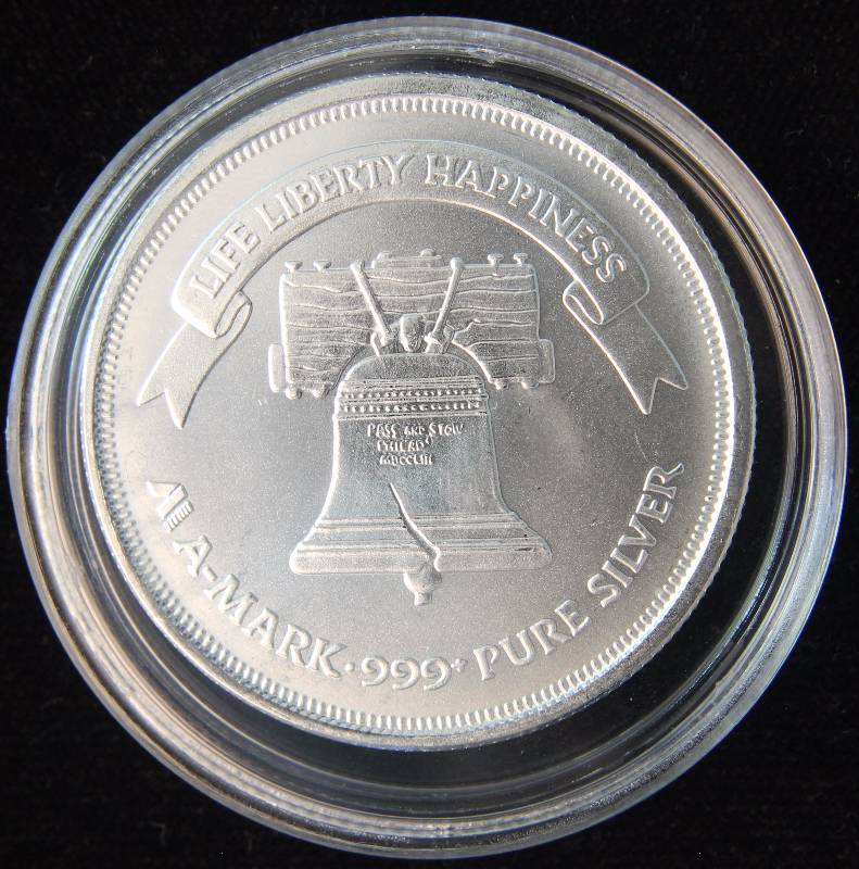 1 TROY OZ. .999 FINE SILVER A-MARK LIBERTY ROUND IN AIRTITE HOLDER