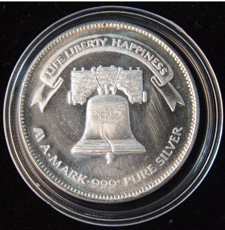 1 TROY OZ. .999 FINE SILVER 1982 A-MARK LIBERTY ROUND IN AIRTITE HOLDER