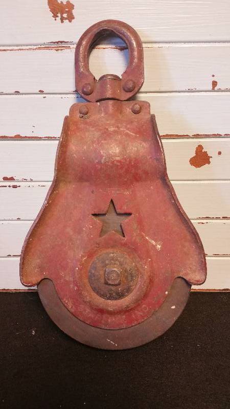 lot 104 image: Antique Starline Iron & Wood Barn Pulley