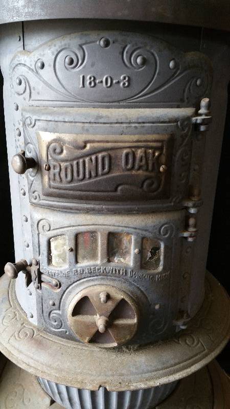 lot 1 image: Antique Round Oak 18-0-3 Wood Stove