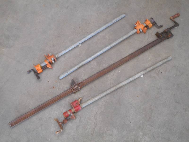 lot 28 image: (4) Steel Bar Clamps (3) 36 & (1)...