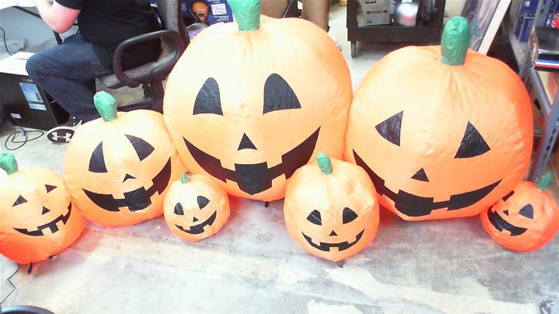 lot 39 image: Alcove 8ft long Inflatable 7 Pumpkin Jack-o-lantern NEW OPEN BOX Halloween