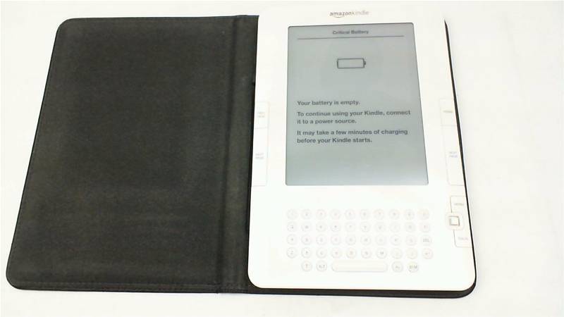lot 104 image: Amazon Kindle D00701 With Charger And Case