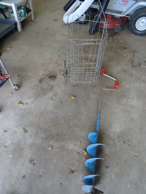 lot 21 image: Hand ice auger. SHopping cart