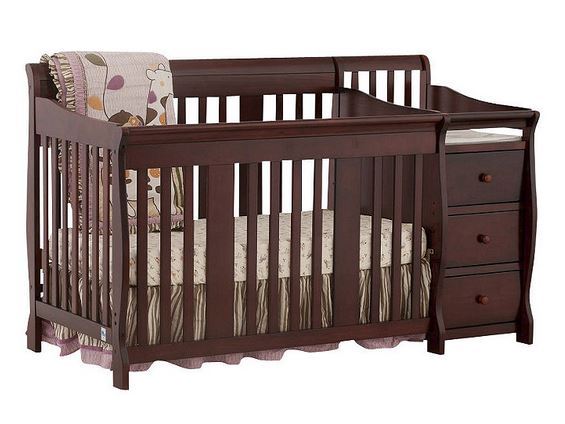 lot 129 image: Storkcraft Portofino 4-in-1 Convertible Crib with Changing Table