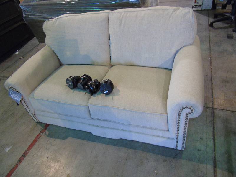 lot 110 image: Signature Design by Ashley Milari Loveseat