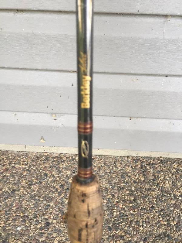 lot 12 image: FISHING ROD AND OPEN FACE REEL