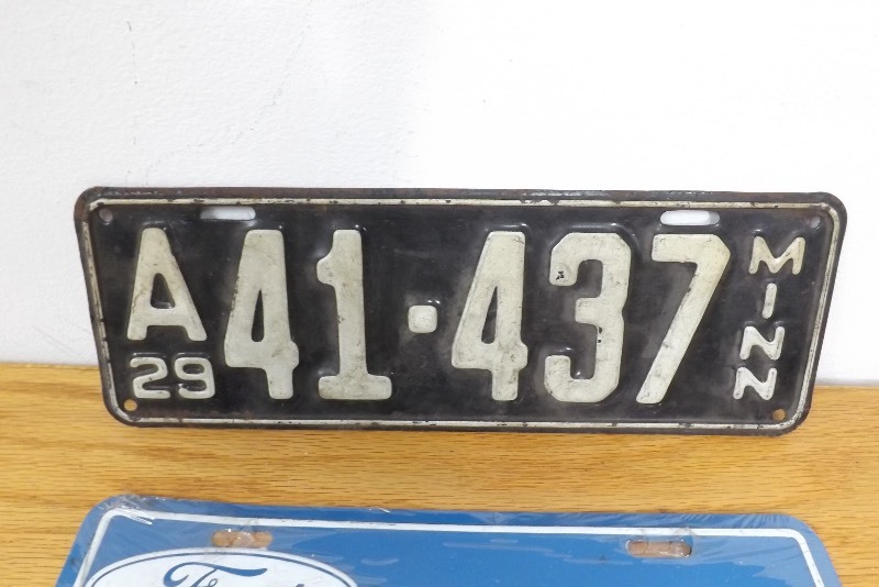 lot 17 image: Antique 1929 MN License Plate and New Ford Mustang License Plate