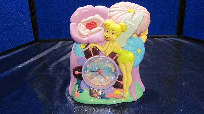lot 4 image: Tinker Bell Bank and Clock