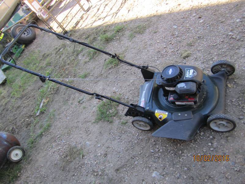 lot 20 image: Bolens MTD 21 side discharge mower...
