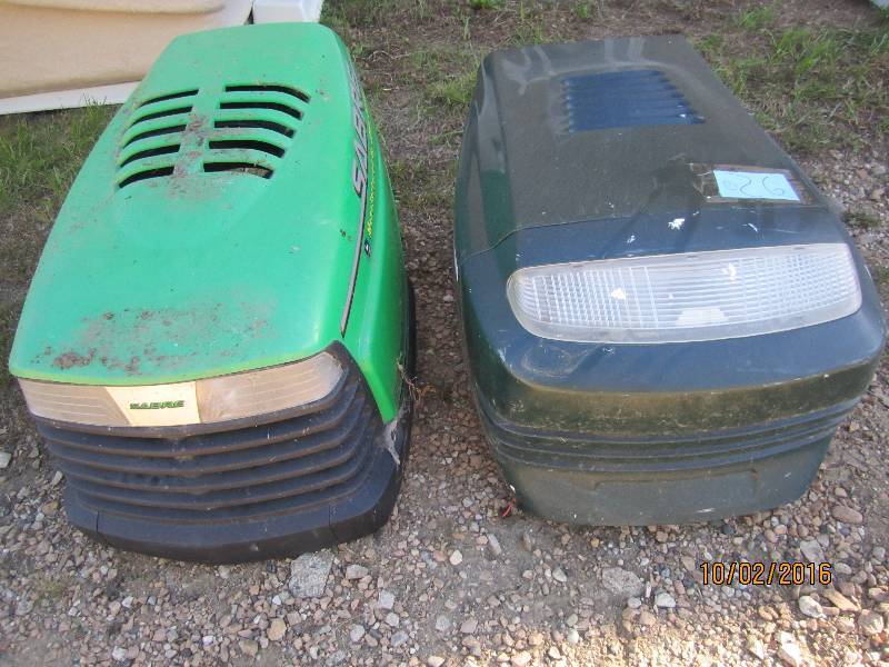 lot 26 image: 2 riding mower hoods...