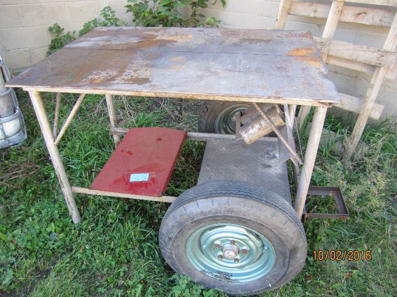 lot 33 image: Metal shop cart on large wheels, to...