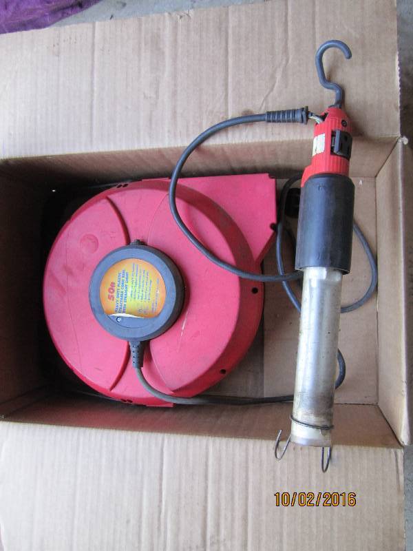 lot 46 image: 50 foot heavy duty retractible cord...