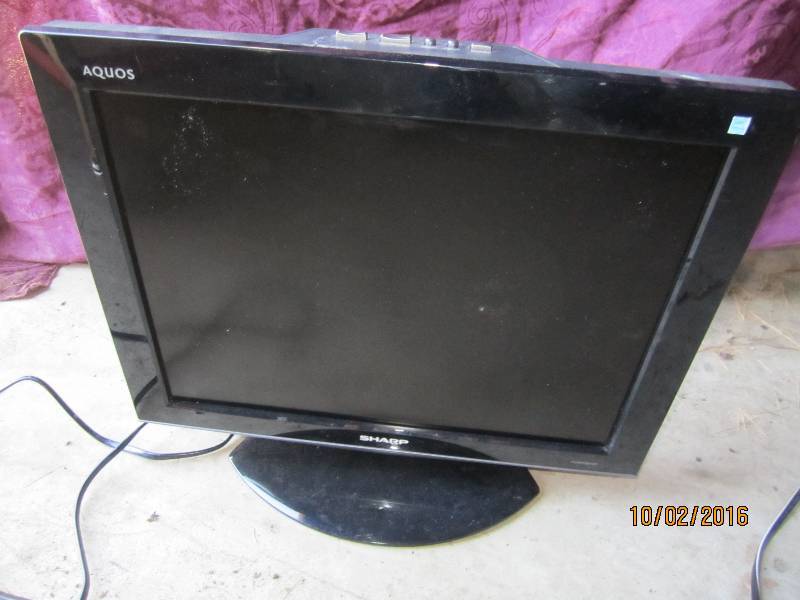 lot 54 image: Sharp flat screenTV monitor, 19...