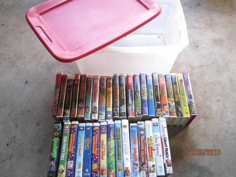 lot 66 image: Sterilite tote of kids movies...