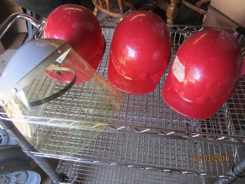lot 82 image: 3 Helmets and a face guard...