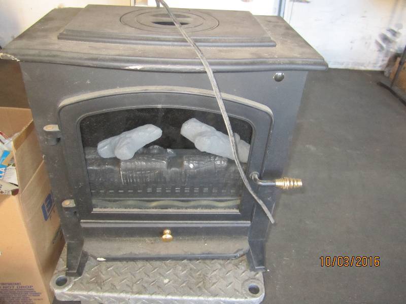 lot 132 image: Electric fireplace heater...