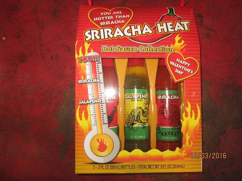 lot 134 image: Sriracha Hot sauce set...