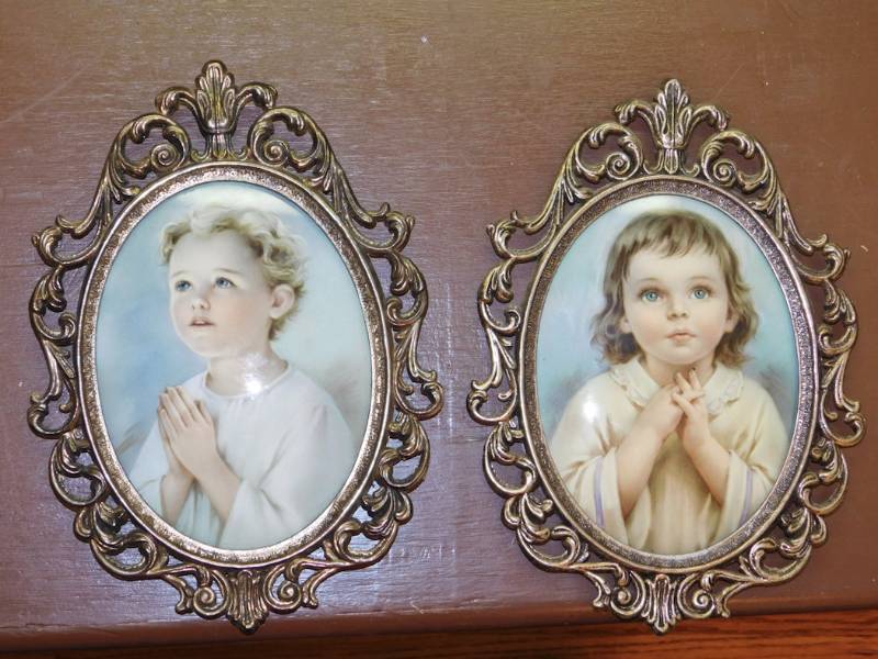 lot 95 image: 2 metal oval framed boy and girl