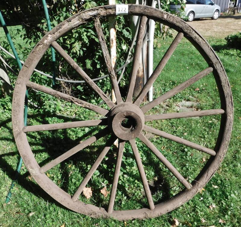 lot 122 image: large wooden wagon wheel with metal rim